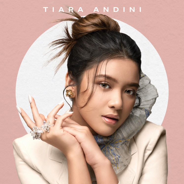 Pastel joy: The cover of Tiara Andini's self-titled debut solo album, which drops December 17. (Courtesy of Winston Gomez/Universal Music Indonesia)