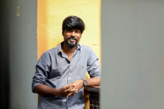 In this picture taken on November 27, 2021, Tamil film director P.S. Vinothraj poses during the 52nd International Film Festival of India in Panaji.