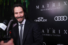 Actor Keanu Reeves attends the Canadian Premiere of 'The Matrix Resurrections' held at Cineplex's Scotiabank Theatre on December 16, 2021 in Toronto, Ontario.