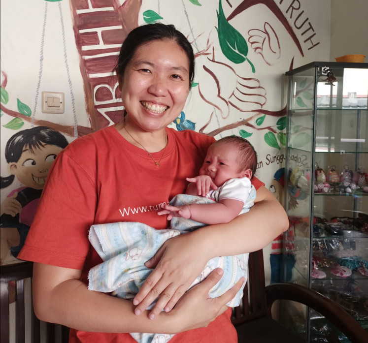 Dedication: Devi Sumarno, a 41-year-old woman who is dedicating her life to helping unmarried women experiencing unplanned pregnancies (Devi Sumarno)