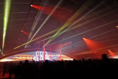 People attend the Soundstorm music festival, organized by MDLBEAST, in Banban on the outskirts of the Saudi capital Riyadh on December 16, 2021. 