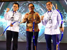 Then-BTN president director Pahala N. Mansury (left) attends the company's national working meeting in Jakarta on Jan. 10, 2020.