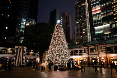 A giant Christmas Tree is seen during Boxing Day at Tai Kwun in Hong Kong’s Central district on Dec. 26, 2021.