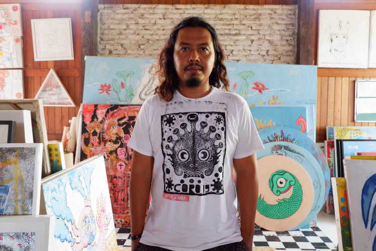 Made from trash: Artist Made Bayak created the Plasticology campaign in the early 2000s when he was a student at the Indonesian Art Institute (ISI) in Denpasar. (JP/Alez Kurniawan Ulung)