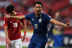 Thailand's Bordin Phala celebrtes scoring during the first leg of the AFF Suzuki Cup 2020 football final match between Indonesia and Thailand at the National Stadium in Singapore on December 29, 2021. 