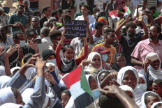 Sudan security forces fire tear gas at large anti-coup rally