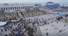 This video grab taken from drone images courtesy by Azamat Sarsenbayev shows protesters gathering in a square outside an administration office in Aktau, the capital of the resource-rich Mangistau region in Kazakhstan on January 6, 2022. Long seen as one the most stable of the ex-Soviet republics of Central Asia, energy-rich Kazakhstan is facing its biggest crisis in decades after days of protests over rising fuel prices escalated into widespread unrest. 