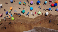 Aerial view of people at the Grande beach in Mar del Plata, Argentina, on January 11, 2022. 