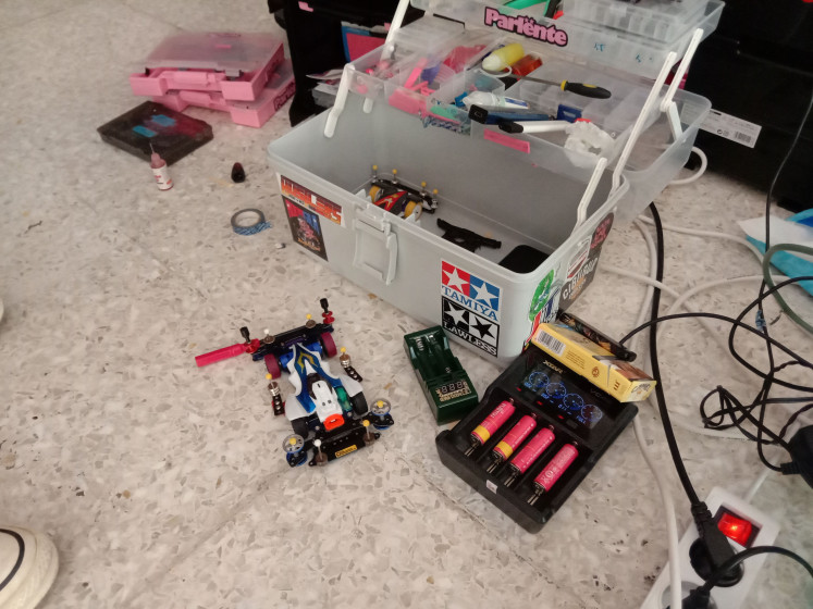 Serious tinkering: The Parlente Tamiya team’s toolbox contains some of the tools and parts it uses to modify and maintain their Mini 4WDs. (Courtesy of Radhiyya Indra)