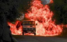 Palestinian actors and crew shoot a scene of the series by local Al-Aqsa TV "Qabdat al-Ahrar," meaning "Fist of the Free" in Arabic, in Gaza city on December 29, 2021. In the Hamas-ruled Gaza Strip, an impoverished Palestinian territory with scant resources for entertainment, a crew from Al-Aqsa TV is shooting a "pro-resistance" series aiming to present their side of the Israeli-Palestinian conflict, intended as a spin on the popular Israeli series "Fauda", followed worldwide on streaming services such as Netflix, HBO, and Apple TV, yet largely regarded by Palestinians as Israeli propagnda.