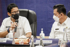 Tourism and Creative Economy Minister Sandiaga Uno (left) and Riau Islands Governor Anshar Ahmad attend a meeting in Bintan, Riau Islands, on Jan. 21, 2022.