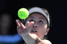 Australian Open to allow 'Where is Peng Shuai?' shirts after backlash