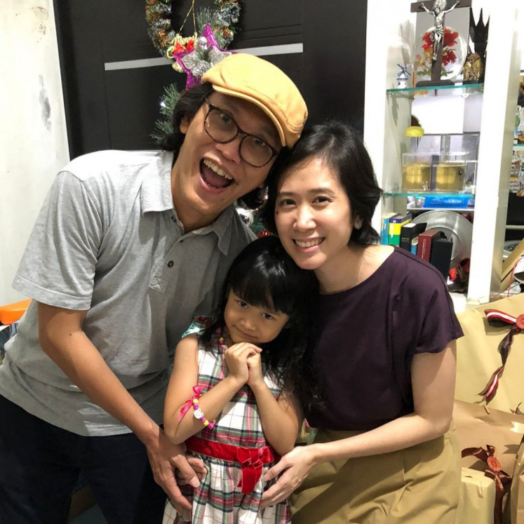 Happy days: Yuka Dian Narenda (left) with his wife and daughter. (Courtesy of Yuka Dian Narendra)