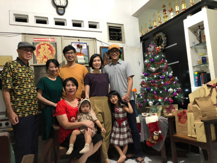 Special time: Yuka Dian Narendra (far right) and his wife don't want to overcomplicate their cultural celebrations. (Courtesy of Yuka Dian Narendra)