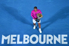  Nadal comes from two sets down to make history with 21st Slam 