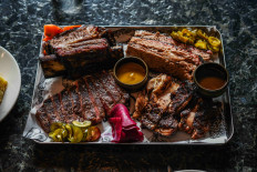 Full platter: Meatsmith Jakarta's trademark ribeye, short ribs and jerk chicken with barbecue mustard aioli. (Courtesy of Meatsmith Jakarta)
