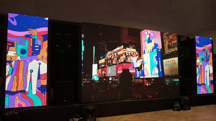 It's official!: Live projection during the Superlative Gallery opening on January 11 of SSS advertisements at Times Square NYC. (Courtesy of Superlative Secret Society)