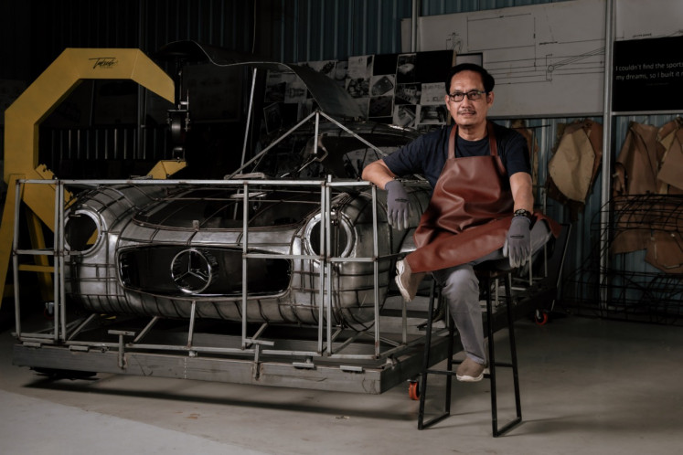 Lifelong passion: Pudji Handoko of Bali's Tuksedo Studio says that his experience as an architect helps him to decode the original blueprints of vintage cars. (Courtesy of Pudji Handoko)