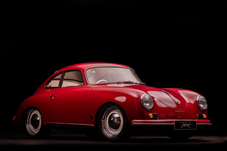 An exact copy: Pudji explains that a recreation car is an exact copy of a car through its original blueprint. Pudji and his team have built various car, including the red Porsche 356 A Coupe. (Personal Collection/Courtesy of Pudji Handoko)