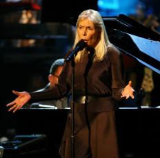 Still standing up: Joni Mitchell performs during the Thelonious Monk Jazz Tribute Concert For Herbie Hancock at the Kodak Theatre in Los Angeles, California, on Oct. 28, 2007. Mitchell is pulling her music from Spotify to support Neil Young, who clashed with the streaming platform over promoting alleged misinformation via its wildly popular podcast, Joe Rogan Experience.