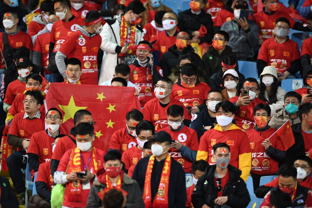 Chinese fans gather in the stands ahead of the FIFA World Cup Qatar 2022 qualifying round Group B football match between Vietnam and China at My Dinh National Stadium in Hanoi on February 1, 2022. 