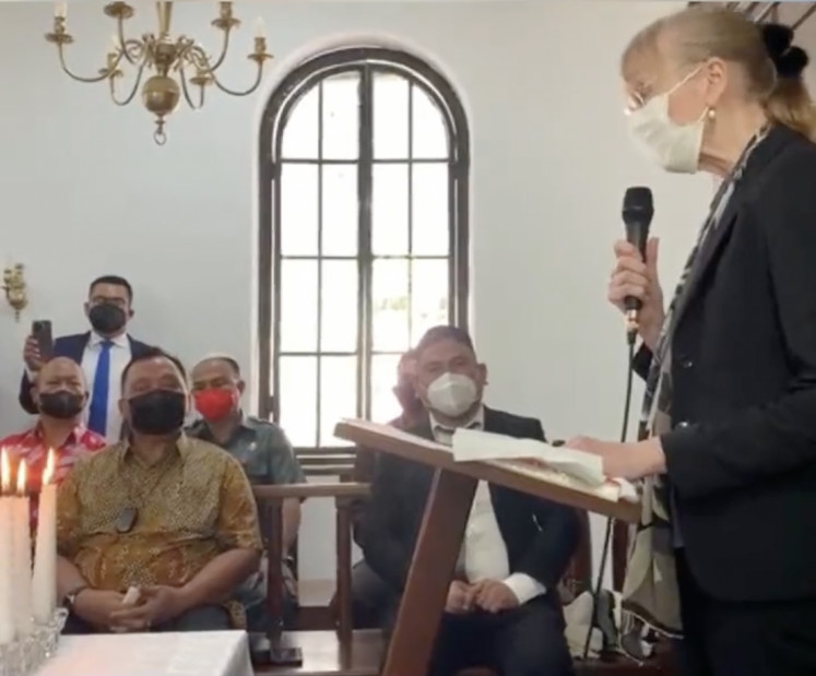In this screenshot taken from a video posted on her official Twitter account on Jan. 27, 2022, German Ambassador to Indonesia Ina Lepel (right) delivers remarks to open Indonesia's only Holocaust Museum in Minahasa, North Sulawesi. The museum has drawn the ire of Indonesian Muslim groups.