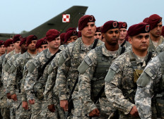 The first American troops arrive at the airport in Swidwin, Poland on April 23, 2014, after Washington said it was sending a force of 600 to the Baltic states as the crisis over Ukraine deepens .
