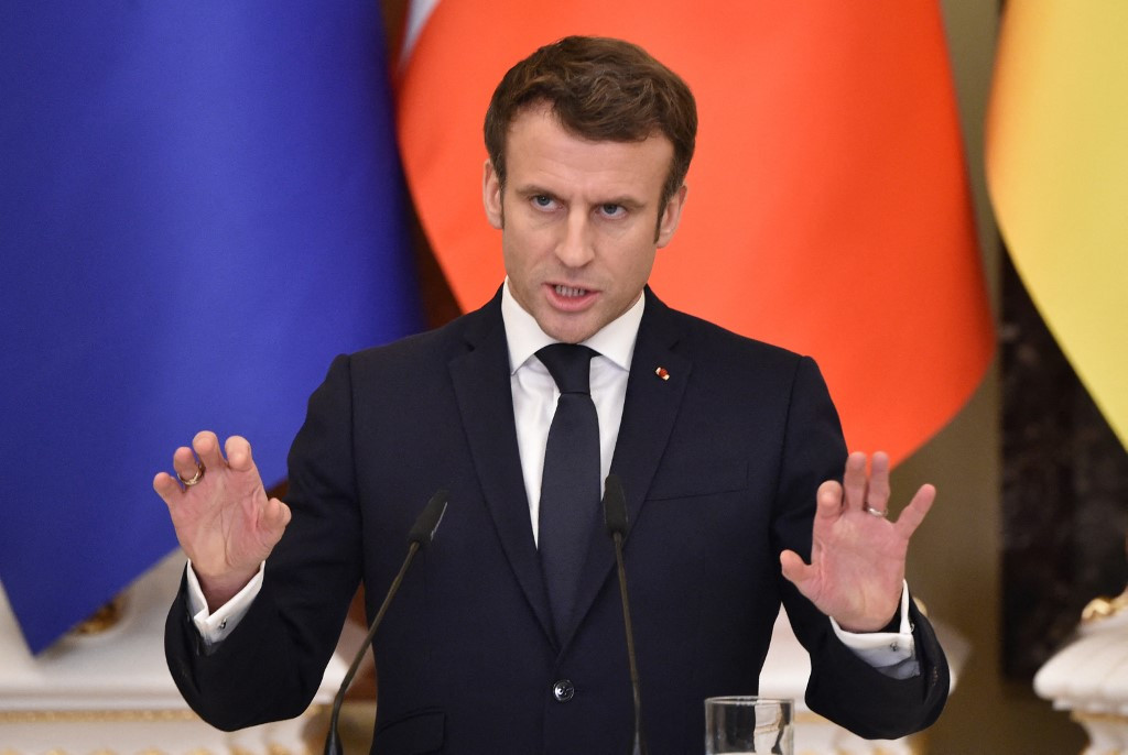 Macron says Le Pen's program will scare international investors