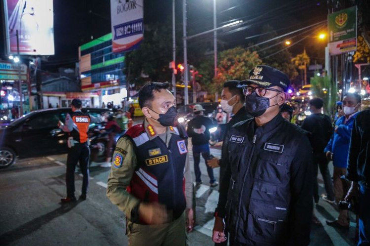 Inspection: Bogor's mayor, Bima Arya Sugiarto, inspects new year's celebrations in his city last December to prevent crowds forming (kompas.com/Ramdhan Triyadi Bempah)
