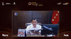 Coordinating Maritime Affairs and Investment Minister Luhut Pandjaitan speaks at the Mandiri Investment Forum 2022 via video link on Feb. 9 in Jakarta.