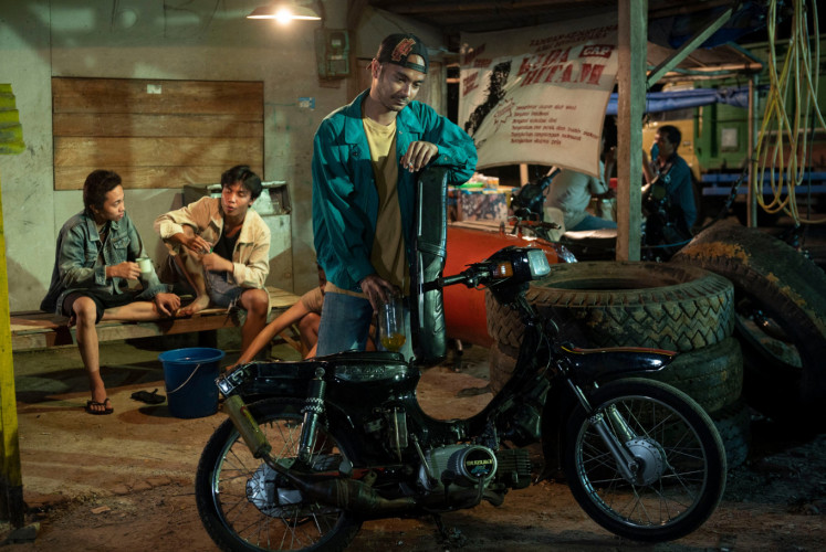From books to big screens: Still image from 'Seperti Dendam, Rindu Harus Dibayar Tuntas', a movie adaptation of Eka Kurniawan's acclaimed novel. (Twitter/Courtesy of Sepertidendam) *CHECK ITALICS FOR PRINT*
