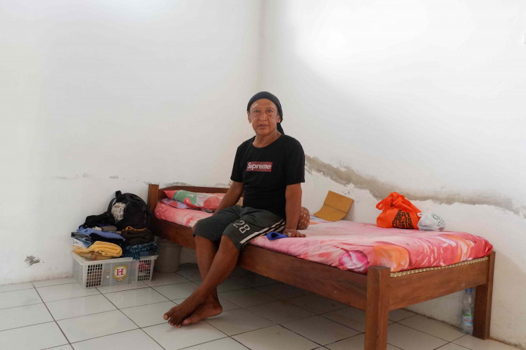 Former street singer: Trans woman Heru Cahyono, 69, finds happiness at the WCC’s shelter because she gets good care for free. She no longer works due to her chronic heart and kidney conditions. She had been a street singer for over 40 years.   (JP/A. Kurniawan Ulung)
