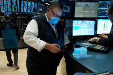 Traders work on the floor of the New York Stock Exchange (NYSE) on Feb. 4, in New York City, the United States.