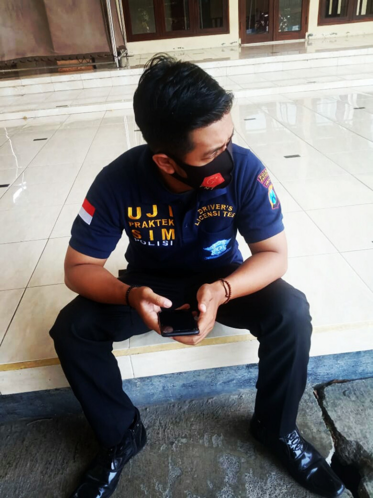 Accidental fate: A man named Polisi work at Pasuruan Police station in East Java. (Personal Collection/Courtesy of Polisi)