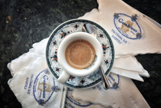 A picture taken on February 13, 2022 shows a cup of espresso coffee at the historic Gran Caffe Gambrinus in Naples, Italy.