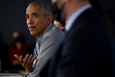 In this file photo taken on November 08, 2021 former US President Barack Obama speaks at an event at the University of Strathclyde in Glasgow during the COP26 UN Climate Change Conference.