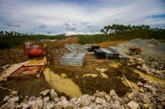 Softbank pulls out of capital city project