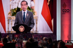 Participants listen to the opening address by President Joko "Jokowi" Widodo (on screen) during the opening of the Group of 20 finance ministers’ meeting in Jakarta on Feb. 17.