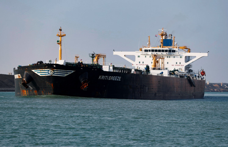 American crude oil tanker Kriti Breeze is moving through the Suez Canal in Suez, Egypt, on Feb. 15, 2022.
