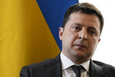 Ukrainian President Volodymyr Zelenskyy attends a meeting with Britain's Prime Minister during the Munich Security Conference in Munich, southern Germany, on February 19, 2022. During the 58th Munich Security Conference running from February 18-20, 2022, international diplomats and experts meet to discuss topics such as global order, human and transnational security, defense or sustainability.