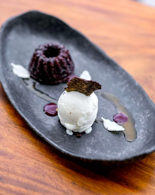Sweet tooth: The chocolate rum cake with cherry sauce and vanilla ice cream is a must-try dessert at Mervilla.  (Instagram/Courtesy of Mervilla)