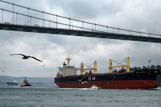 The Marshall Islands-flagged Turkish-owned Yasa Jupiter ship, which was hit by a missile off the coast of Ukraine's port city Odessa, sails on the Bosphorus in Istanbul, Turkey, on February 25, 2022. The Yasa Jupiter is the first confirmed merchant ship casualty of war following Russia’s invasion of Ukraine, sustaining slight damages but no injury or human loss were reported.