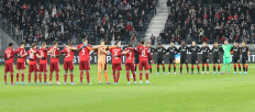 Both teams observe a moment of silence to remember the war victims in Ukraine prior to the German first division Bundesliga football match Eintracht Frankfurt vs Bayern Munich in Frankfurt, Germany, on February 26, 2022. 