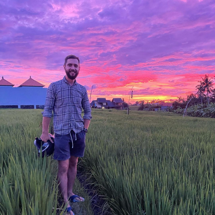 Sanctuary: Yuriy is pictured in a field in Bali, three months after his move to Indonesia. (Instagram/Courtesy of Yuriy)