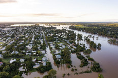  Rooftop rescues in Australia as tens of thousands evacuated from floods 