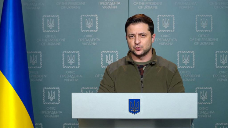 This handout video grab taken and released by the Ukraine Presidency press service on February 28, 2022 shows Ukrainian President Volodymyr Zelensky delivering an address in Kyiv. Ukrainian President Volodymyr Zelensky on February 28 urged the European Union to grant his country immediate membership, as Russia's assault against the pro-Western country went into its fifth day.