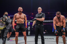 Domination: Two-division ONE world champion Reinier de Ridder (third left) reacts after defeating Kiamrian Abbasov (right) at ONE: FULL CIRCLE on Friday to defend his middleweight crown. 