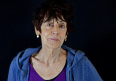 French visual artist Annette Messager poses for a portrait at the Tel Aviv Museum of Art in the coastal Israeli city on February 23, 2022.