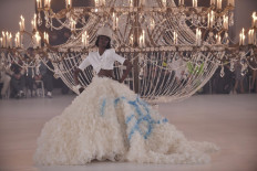 Showtime: A model presents a creation during the Women’s Fall/Winter 2022/2023 Ready-Wear Off-White Collection show during the Paris Fashion Week in Paris on Monday.