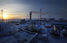 Facilities of the Novoprtovskoye oil and gas condensates oilfield, 250 km north of the town of Nadym in northern Russia, are pictured on Feb. 18, 2015.